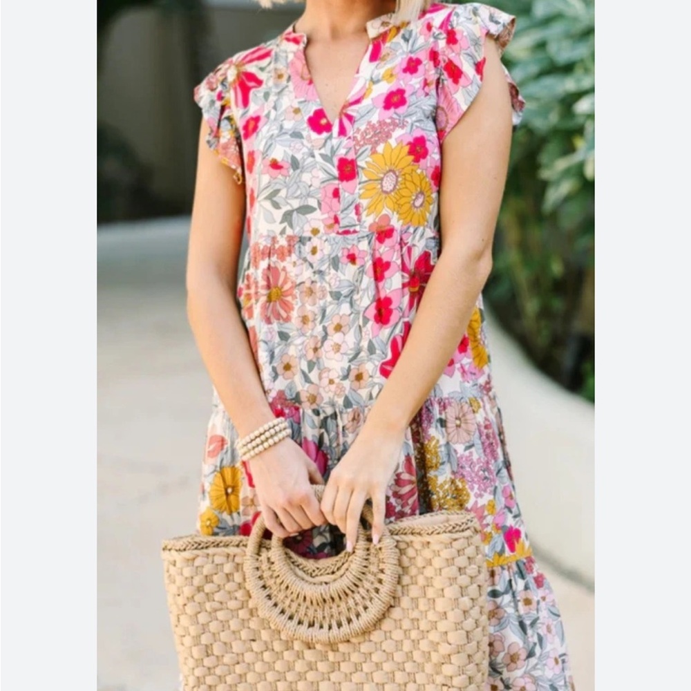 Mint women’s floral swing dress with pockets size medium